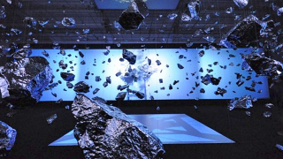 Illustration for article titled How Did This Artist Freeze an Exploding Boulder In Time?
